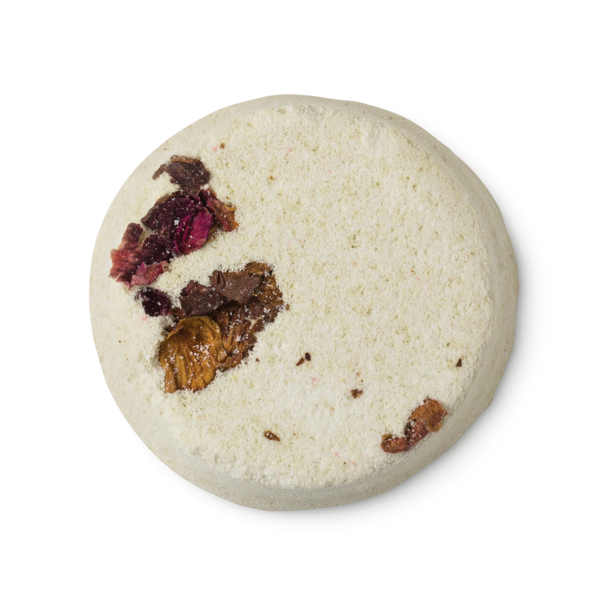 A cream coloured, powdery, circular solid toner tab, pressed with rose petals.